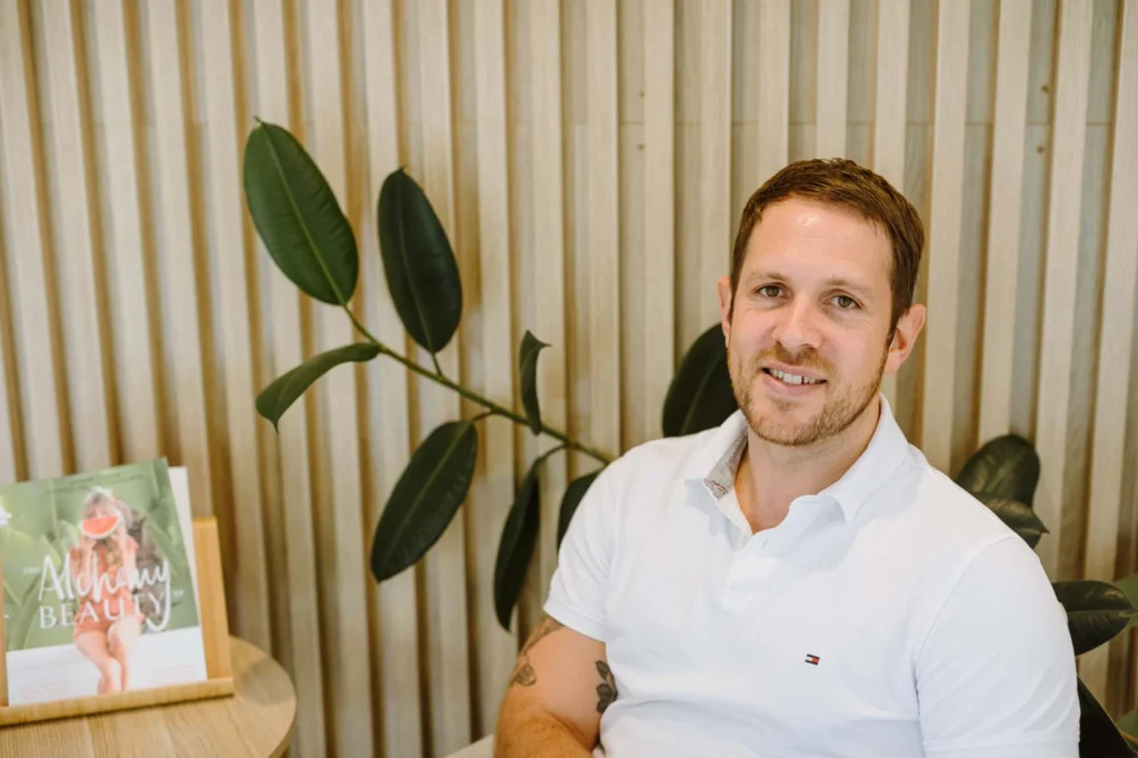 north coast head neck and jaw centre ballina osteopath Leon Erdrich in the reception area of their northern rivers osteopathy clinic